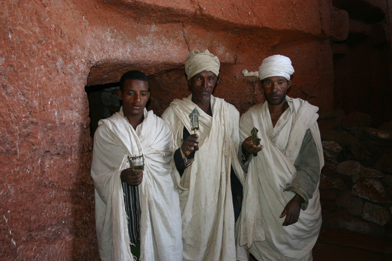 priests at main doorway to church